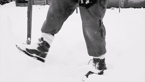playing-in-snow-and-kicking-snow-on-a-Winter's-day-stock-footage-stock-video