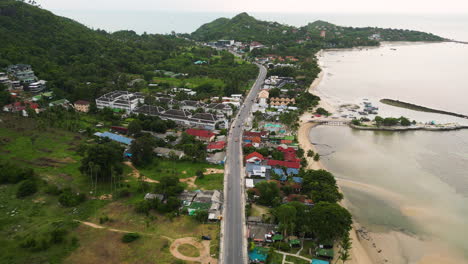aerial-view-of-Maret,-Ko-Samui-District,-Surat-Thani,-Thailand-south-east-asia-travel-destination-for-digital-nomad-drone-footage-of-scenic-coastline-at-sunset