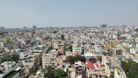 This-aerial-video-shows-Bengaluru,-the-capital-city-of-Karnataka,-as-a-bustling-residential-area-surrounded-by-opulent-apartment-buildings