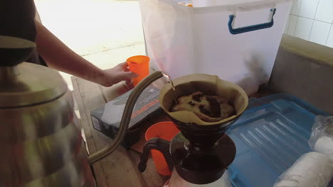 Hot-water-poured-over-fresh-coffee-in-Nicaragua-coffee-farm-hostel