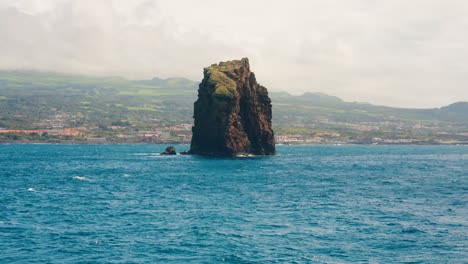 View-of-majestic-rock-in-the-ocean-close-to-Pico-Island-coastline-in-the-Azores,-Atlantic-ocean,-Portugal