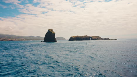 View-of-majestic-rock-in-the-ocean-close-to-Pico-Island-coastline-in-the-Azores,-Atlantic-ocean,-Portugal