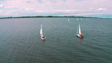 Aerial-shot-of-drone-flying-around-yachts-on-the-sea