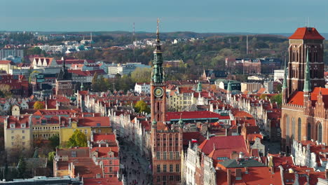 Aerial-view-of-old-town-in-Gdansk,-Poland-with-with-Town-hall-in-the-middle