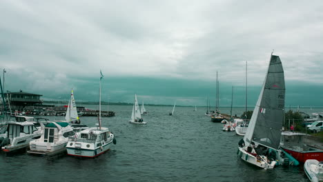 Aerial-view-of-yachts-preparing-to-regatta-race-in-the-marina-in-Puck-city,-Poland