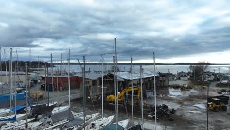 Rising-over-a-boatyard-during-a-pre-storm-squall