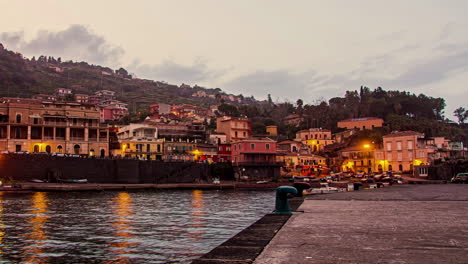 Low-angle-timelapse-of-a-Mediterranean-port-town-in-Sicily-Italy