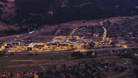 Drone-aerial-view-of-a-busy-resort-area-in-Big-Sky,-Montana