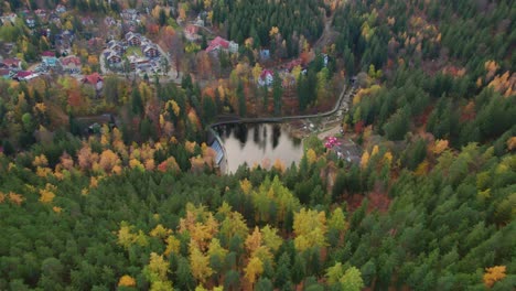 Karpacz,-Poland,-Łomnica-Dam-drone-orbit-view,-autumn-scenery
