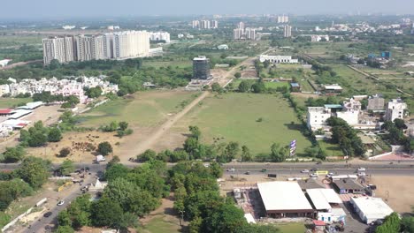 Rajkot-city-aerial-view-Many-cows-in-the-house-are-seen-needing-grass-Big-trees-are-appearing