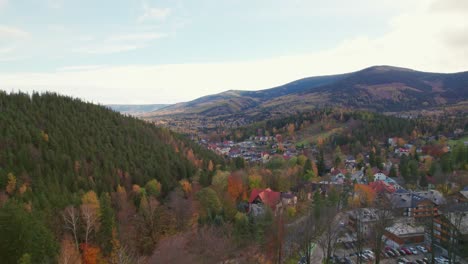 Karpacz,-Poland,-drone-tilt-up-view-autumn
