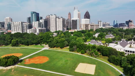 Forwards-fly-above-green-park-with-soccer-and-softball-play-fields