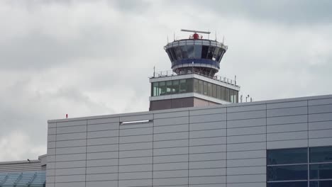 Air-traffic-control-tower-on-airport-with-rotating-radar