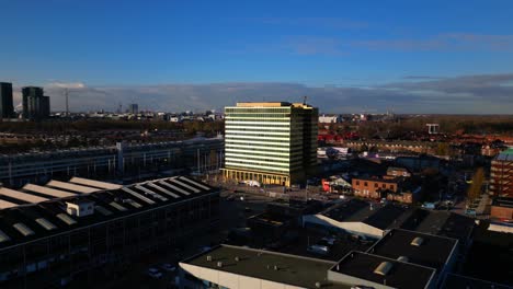 Approaching-Amsterdam-Noord-tourism-destiny-Holiday-Inn-aerial-on-sunny-day