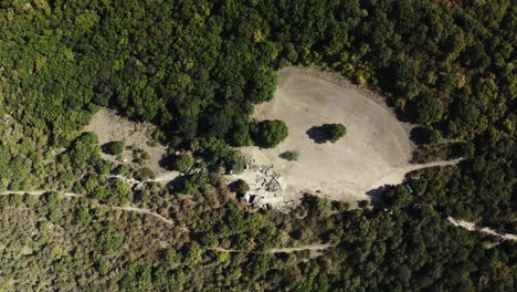 Overhead-drone-shot-of-Bekligtash,-a-prehistoric-rock-sanctuary-in-the-midst-of-a-forest-and-situated-on-the-southern-Black-Sea-coast-of-Bulgaria