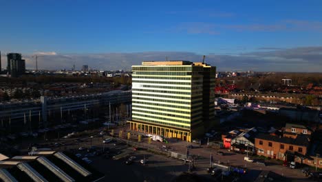 Holiday-Inn-Amsterdam-Noord-yellow-hotel-towers-drone-movement-forward
