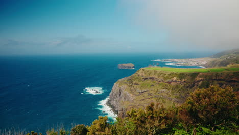 Slow-motion-wide-shot-of-rocky-coastline-from-high-viewpoint