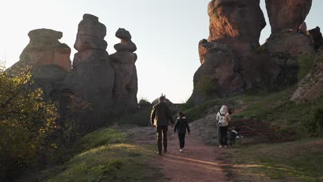 A-family-of-tourists-approaching-the-entrance-of-the-Belogradchik-fortress-in-Vidin-province-in-Bulgaria