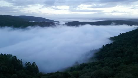 Low-Light-Aerial-View-Of-Sil-Canyon-Covered-By-Dense-Fog,-Galicia,-Spain
