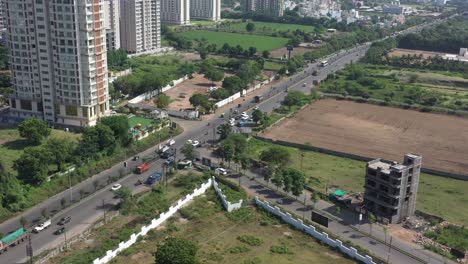 RAJKOT-CITY-AERIAL-VIEW-A-lot-of-high-rise-building-construction-work-is-going-on-near-Kalavad,-and-the-Kalavad-road-intersection-is-a-traffic-jam