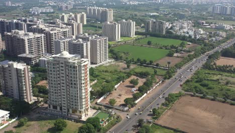 RAJKOT-CITY-AERIAL-VIEW-Lots-of-party-plots-and-farms-along-Kalavad-road-showing-solar-system-on-top-of-high-rise-building