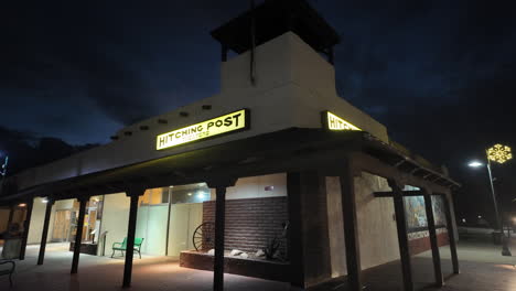 The-Hitching-Post-movie-theater-entrance-and-ticket-office-at-nighttime