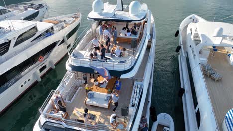 At-a-luxury-boat-show-in-Miami's-marina,-motor-yachts-captivate-with-their-elegance