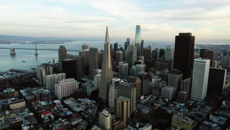 Aerial-view-around-the-downtown-of-San-Francisco,-cloudy-sunrise-in-California,-USA