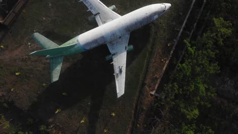 Top-view-of-Abandoned-Airplane-In-A-Field-West-Bali-Negara-Jembrana,-aerial