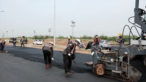 Prozess-Asphaltierung-Straßenbau-Infrastruktur