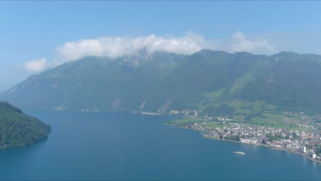 Morschach-Überflug:-Bewegung-über-Malerisches-Wassertal-In-Richtung-Alpen,-Schweiz,-Europa,-Drohne-|-Langsame-Bewegung-In-Richtung-Berg