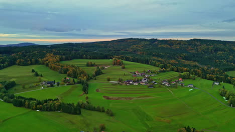 Panoramic-aerial-view-of-the-agriculture-field-and-hills-near-Attersee-Lake-in-Austria