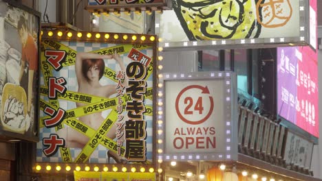 Neon-Street-Signs-for-Restaurant-and-Adult-Entertainment,-Kabukicho,-Tokyo,-Japan