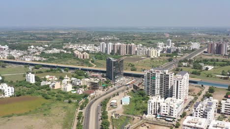 RAJKOT-CITY-AERIAL-VIEW-Drone-is-moving-towards-the-front-where-high-rise-is-visible-residence-houses-and-bungalows-are-visible