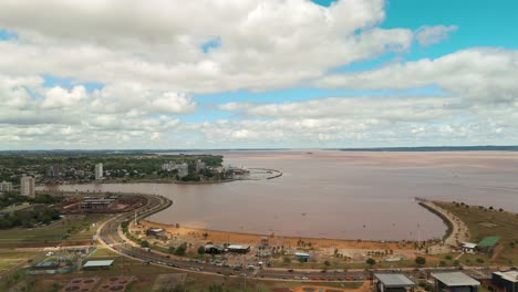 Playa-El-Brete-in-Posadas,-Misiones,-Argentina,-featuring-the-majestic-Rio-Paraná-as-a-grand-backdrop,-creating-a-stunning-riverside-scene