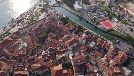 Topdown-view-of-Kotor-old-town-by-adriatic-sea-in-Montenegro,-Orbiting-shot