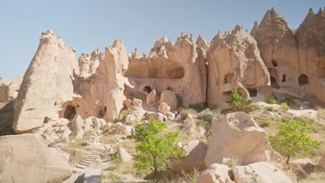 Tourists-group-explore-unique-fairy-chimney-rock-formation-landscape