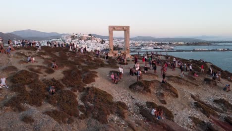 Tourists-enjoying-sunset-at-Naxos-island-Temple-of-Apollo-,Greece,-Aerial-view