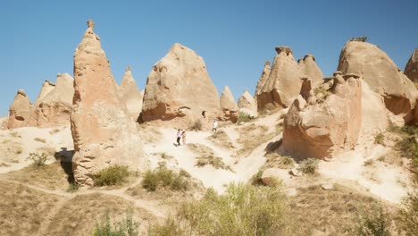 Tourist-explore-imagination-valley-natural-rock-formation-wind-erosion