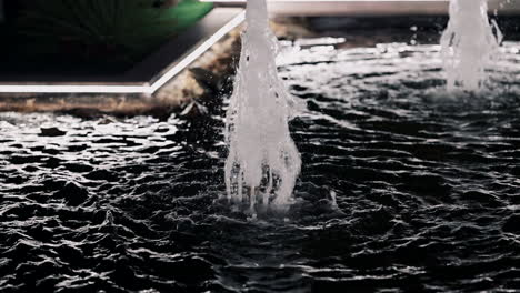 Water-fountain-jets-splashing-into-basin