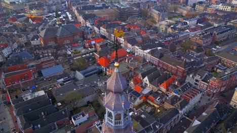 Catholic-crane-on-top-of-cathedral-spire-watching-over-historic-medieval-city-centre