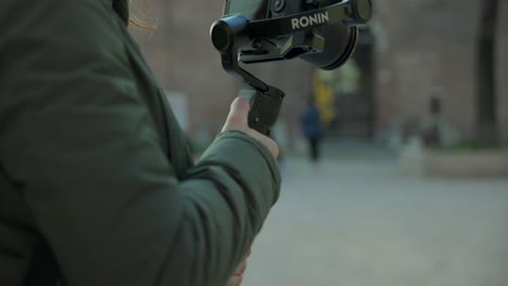 Shooting-with-new-modern-DJI-Ronin-RS3-Mini-stabilized-gimbal-DJI-RS3-Mini
