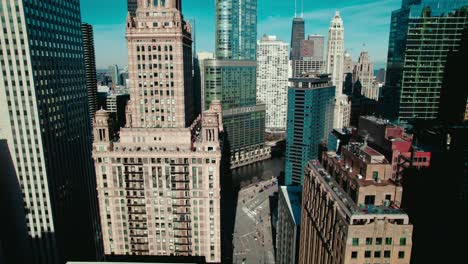 Impactful-aerial-between-Chicago-buildings-with-Trump-International-Tower-in-focus