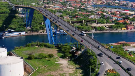 Aerial-establishing-view-of-Queen-Julianna-bridge-in-Willemstad-Curacao-at-midday