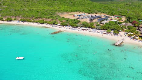Aerial-orbit-pullback-above-Playa-Porto-Mari-white-sand-in-Curacao,-Caribbean