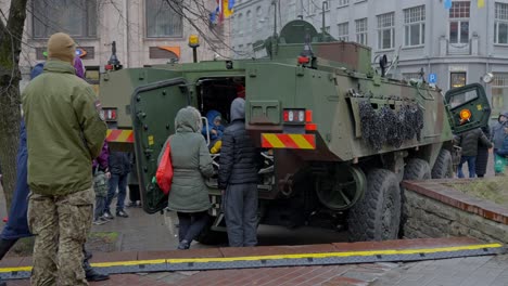 NATO-armored-vehicle-exhibition-in-downtown-Riga,-motion-view
