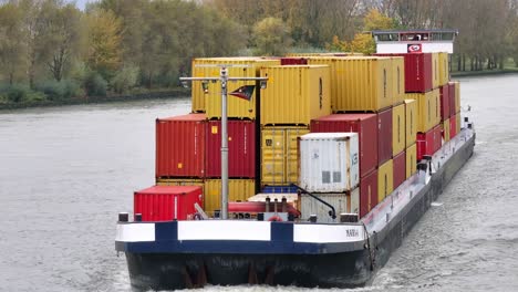 Close-up-aerial-view-of-the-Cargo-vessel-Marla-Duo-sailing-on-river