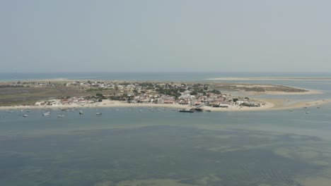 Aerial-Towards-Armona-Island-On-Sunny-Day-In-Portugal
