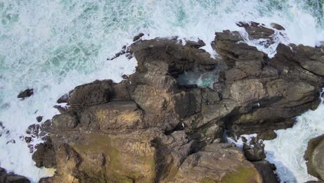 4K-Aerial-Drone-Footage-of-Seagulls-flying-over-rocky-cliffs-in-Brookings-Oregon-near-Northern-California