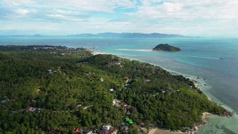Aerial-drone-video-of-Haad-Mae-coastline-and-island-on-Koh-Pha-Ngan-island-in-the-gulf-of-Thailand,-Southeast-Asia